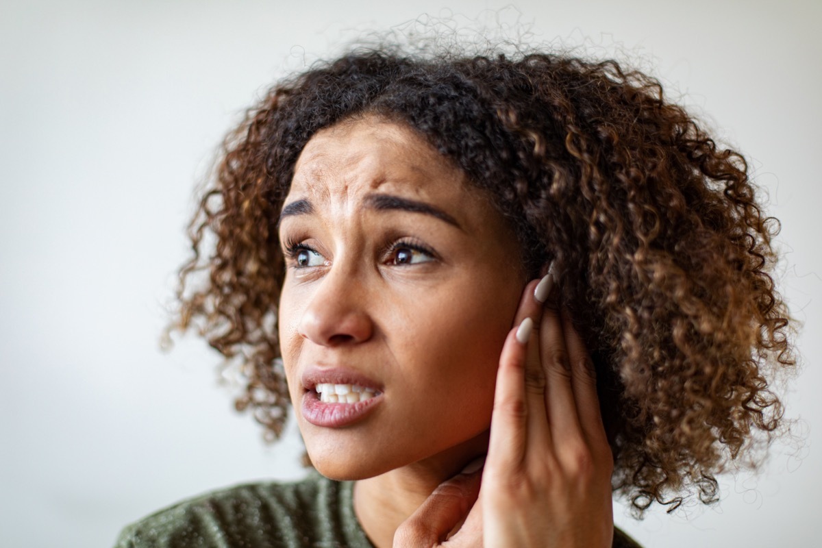 Woman with an ear ache