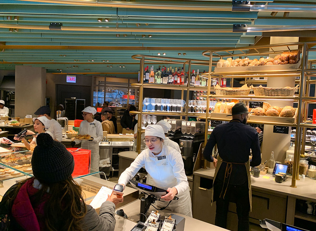 Baker selling food to customer at the Starbucks Reserve Roastery