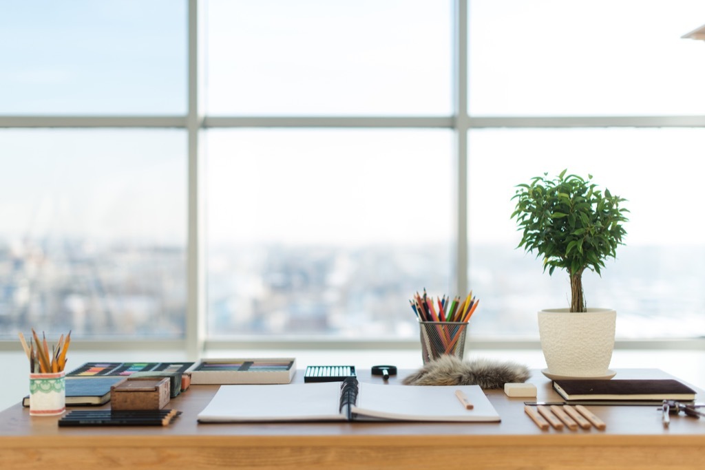 organized desk overlooking east river