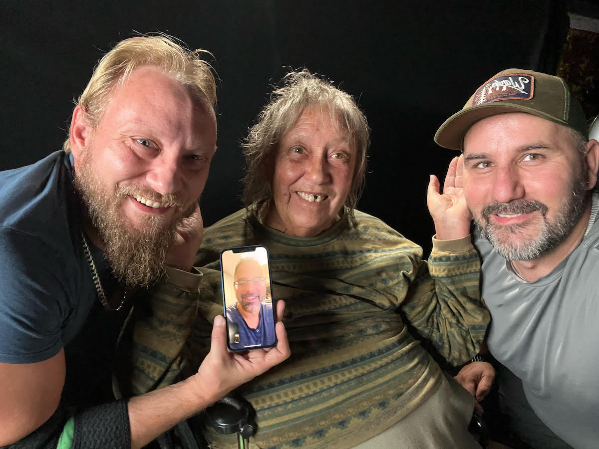 Scott Hansen, Shelley Duvall, Steve Wallenda, and Scott Goldberg (shown on phone via video chat) behind the scenes of 