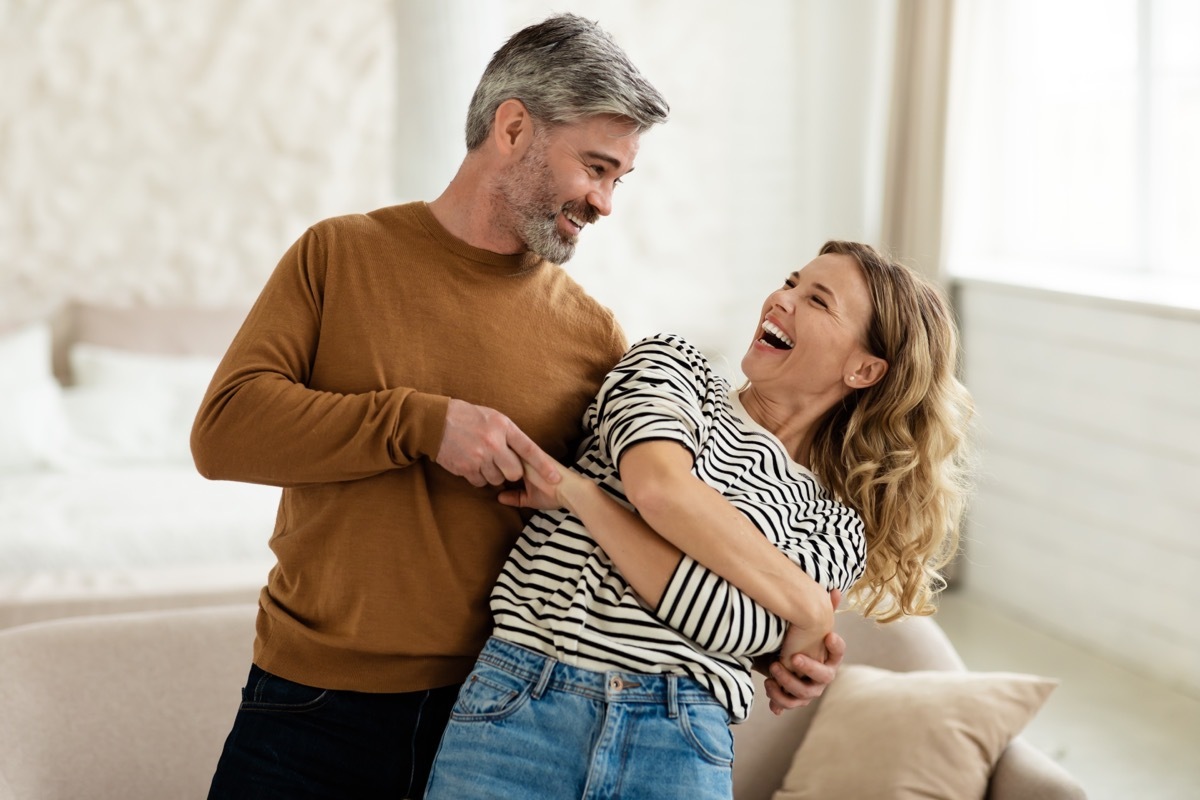 Couple Dancing in Living Room