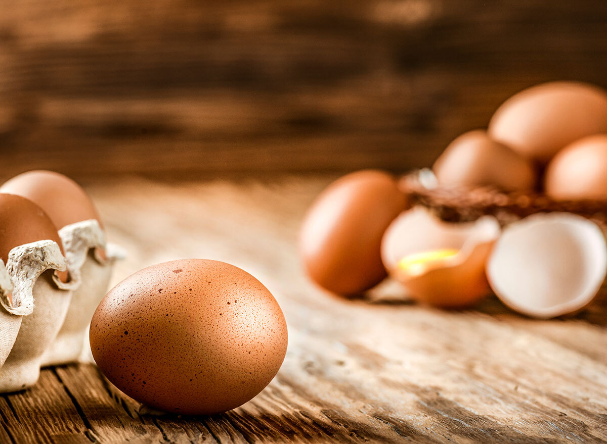 brown eggs on wooden table