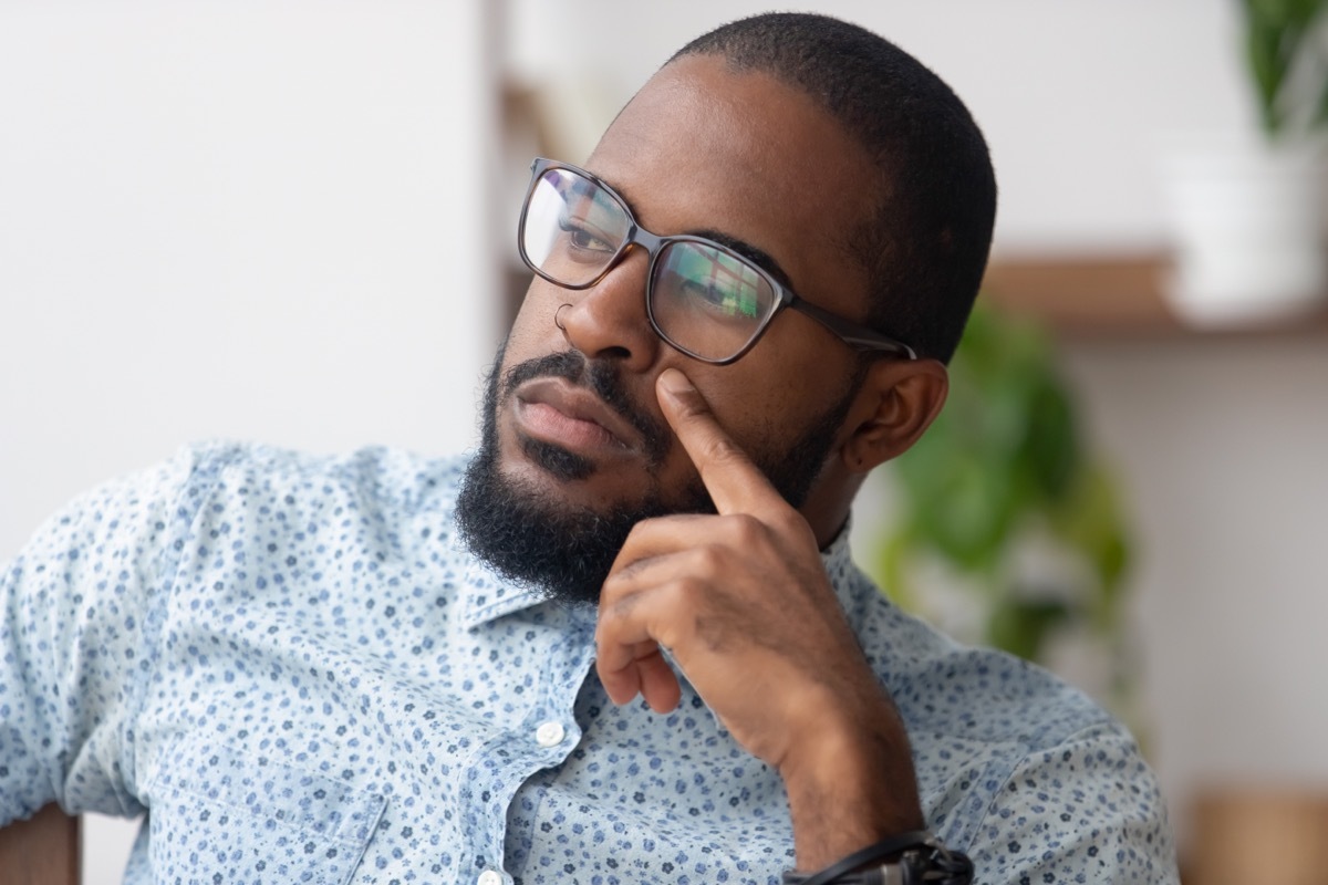 Young Man Thinking About Solutions