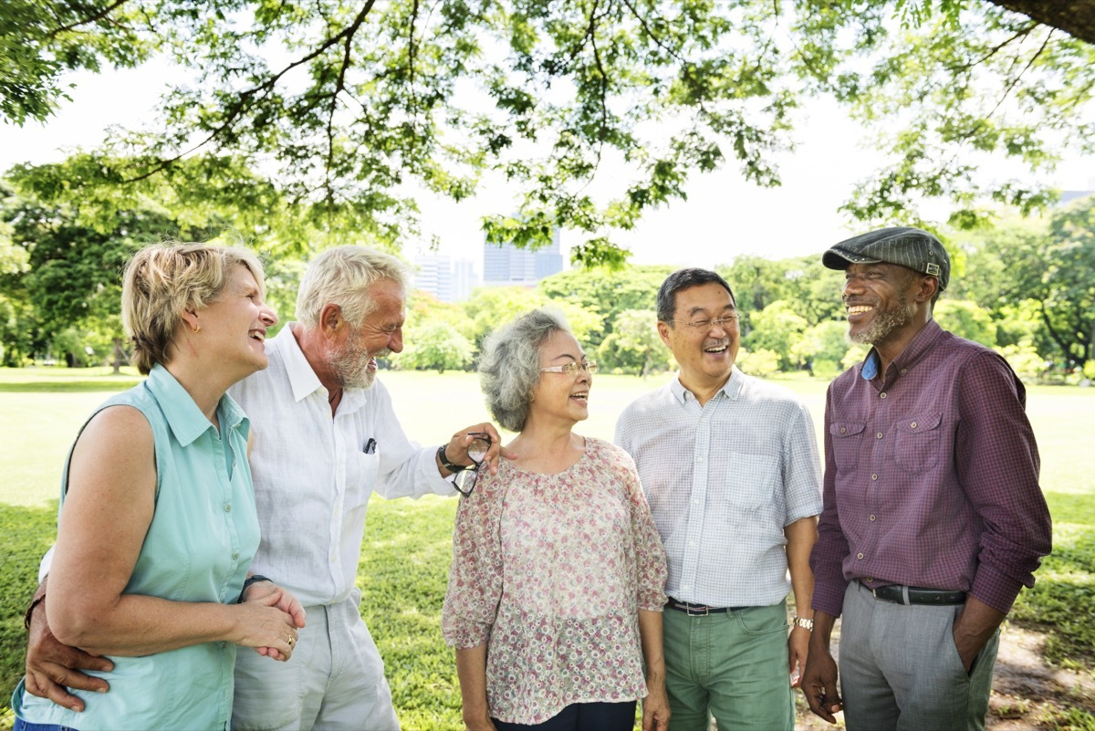 group of mature friends laughing