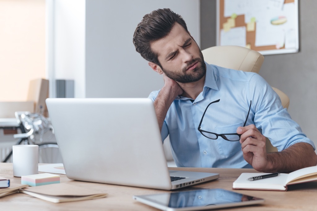 man with neck pain