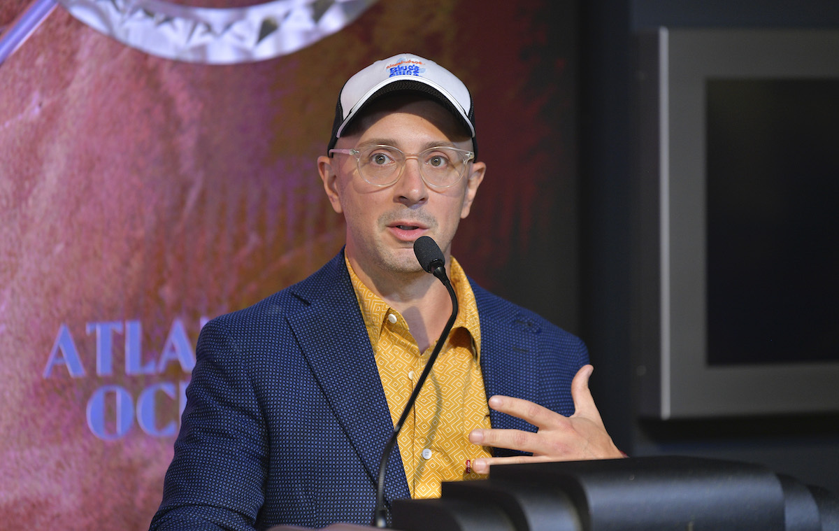 Steve Burns speaking at a lighting of the Empire State Building in blue for the 