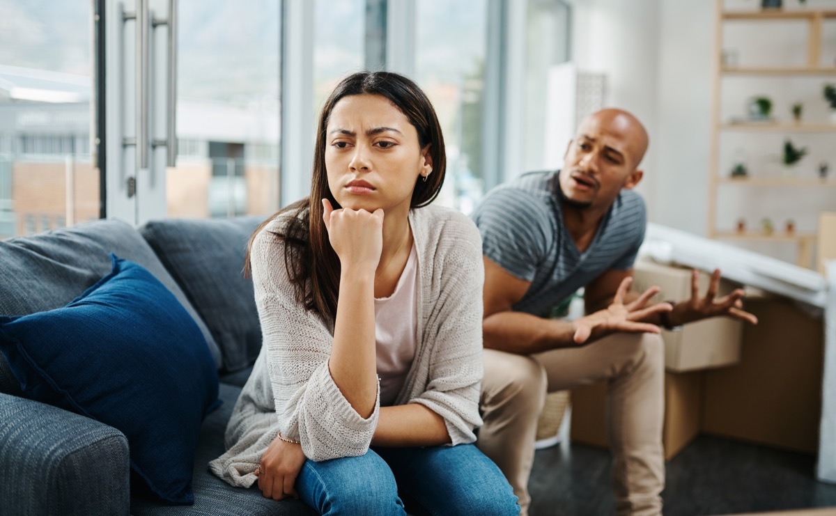 Shot of a young woman looking upset after a fight with her partner at home