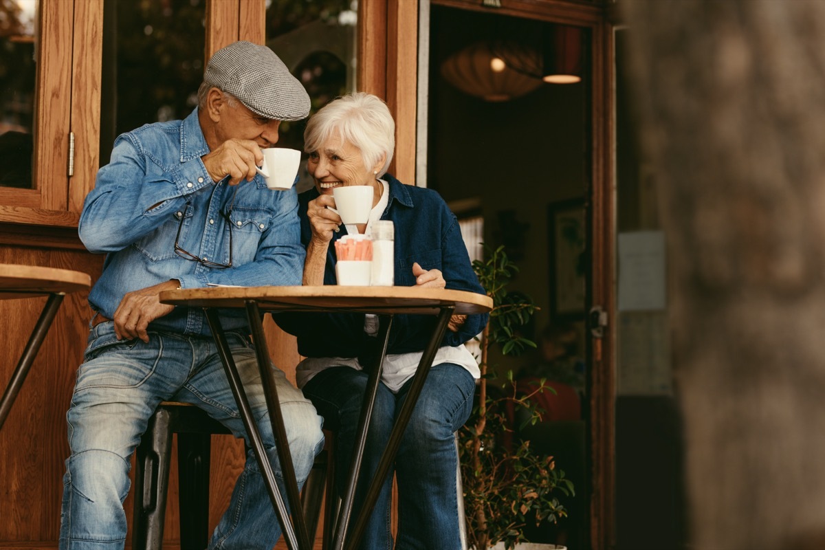 Senior couple drinking coffee at cafe