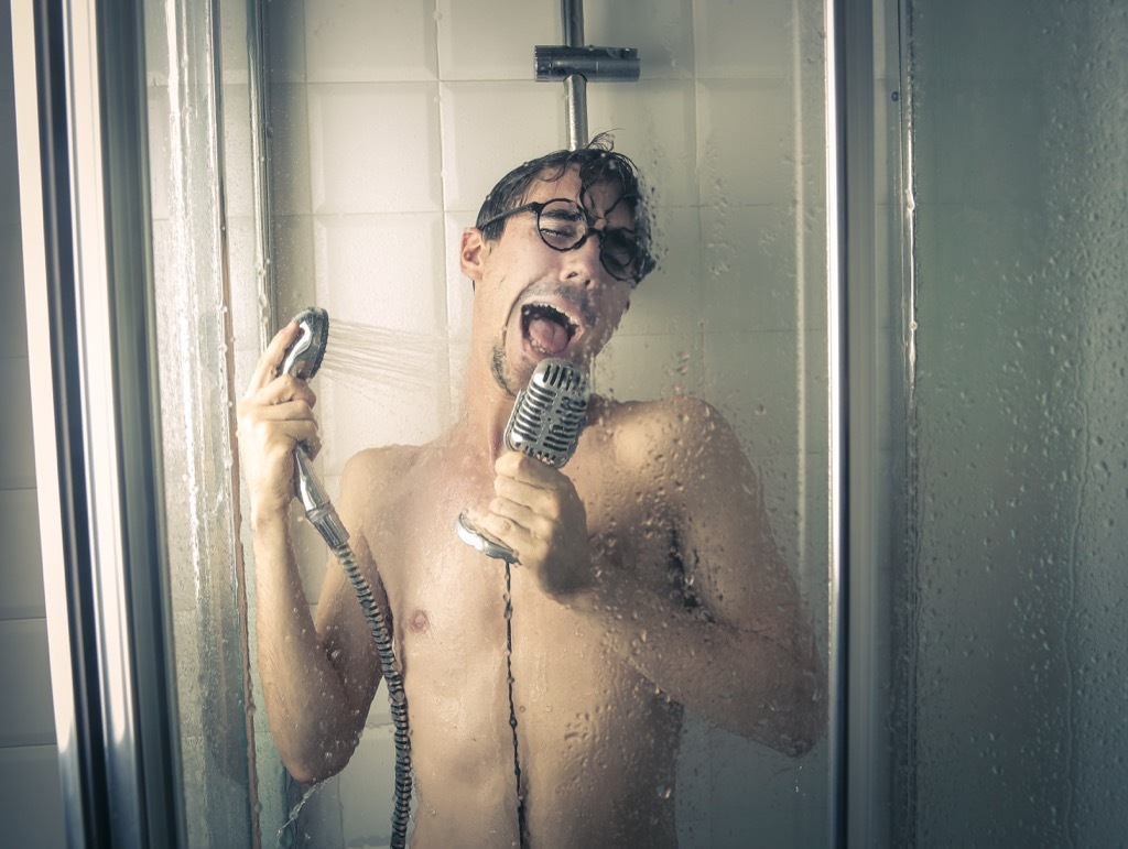 man is singing in the shower.