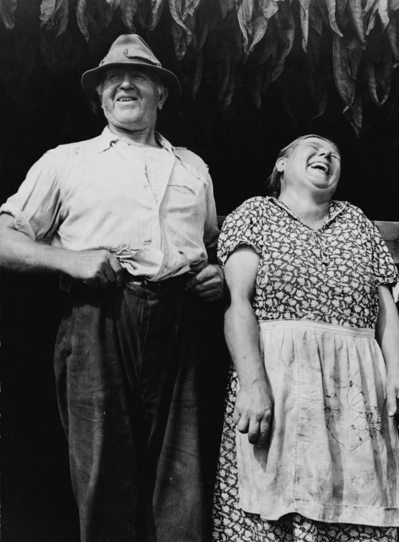 1940s Polish tabacco farmer couple laughing