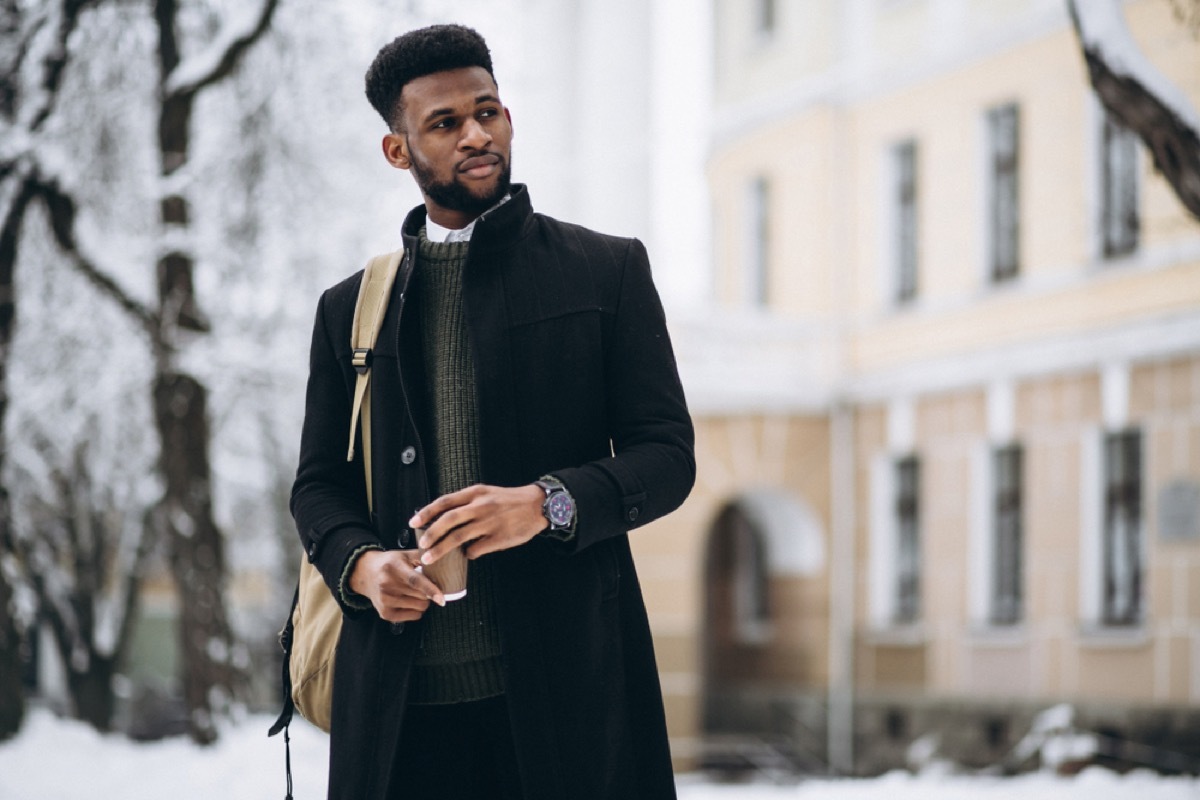 young man in black winter coat outdoors, winter coats for men