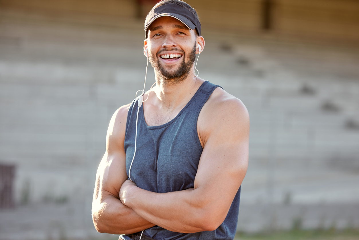 young man working out in a visor