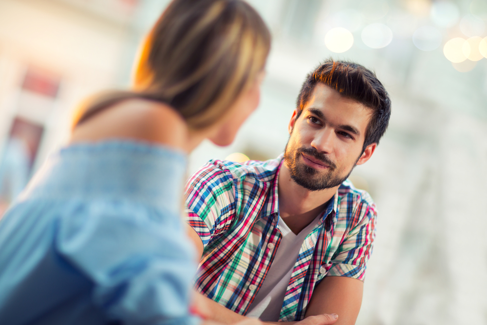 man looks at woman with love