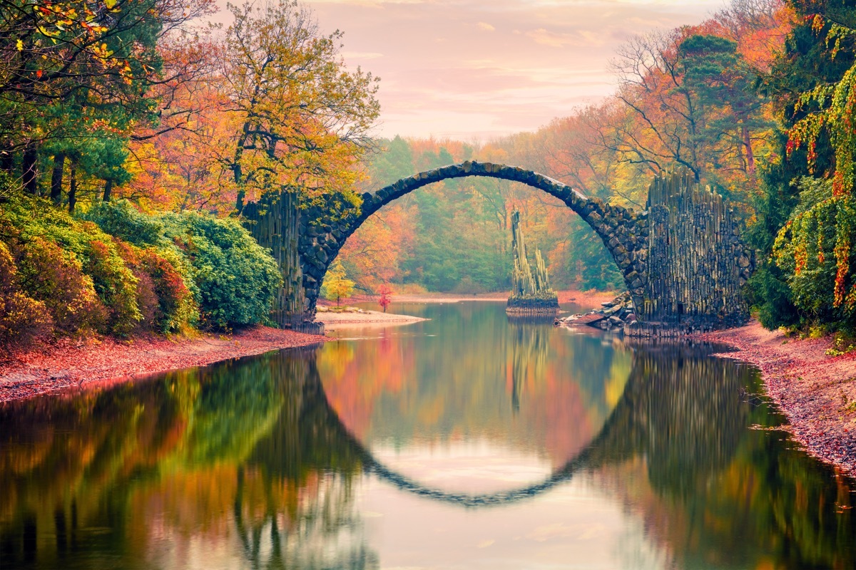 fall bridge in azalea and rhododendron park kromlau germany