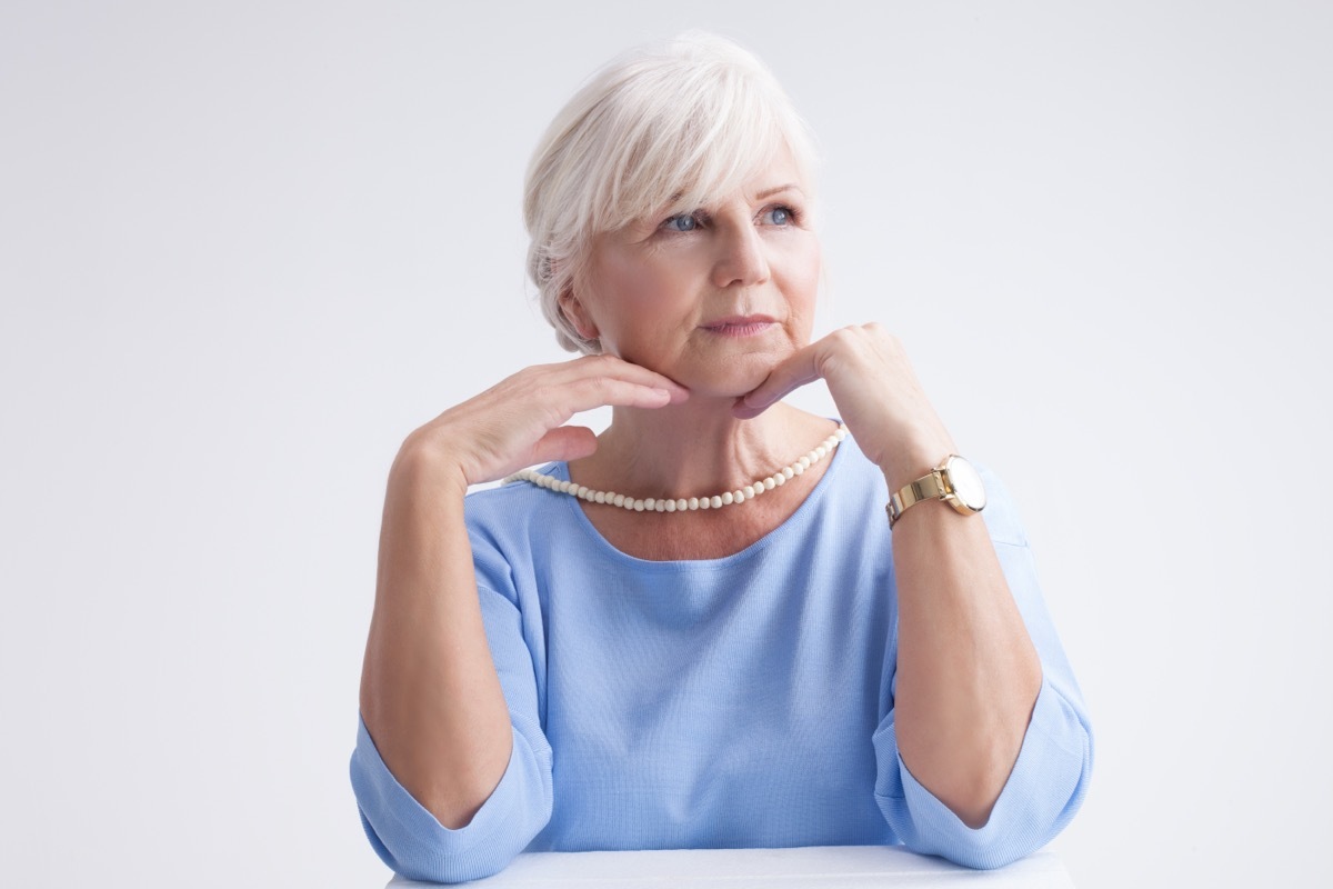 woman wearing classic statement jewelry