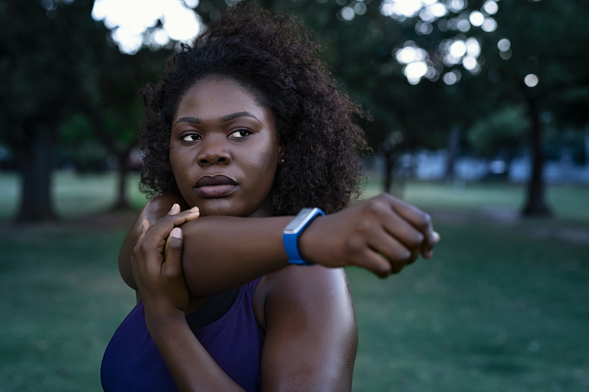 Woman stretching at park