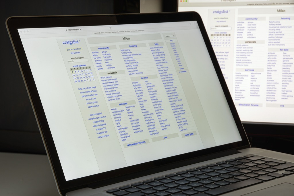 Computer, laptop open with Craigslist