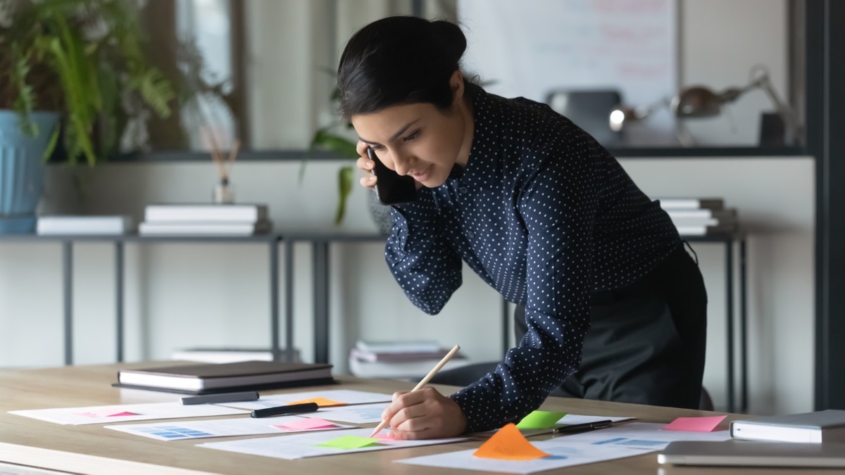 Woman Multitasking While on the Phone