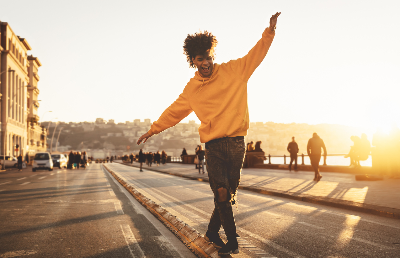 young man outside having fun