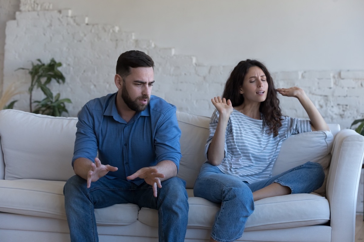 Angry Couple Yelling on the Couch