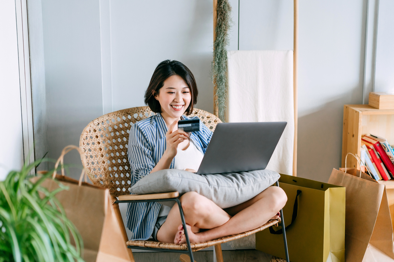 young asian woman shopping online