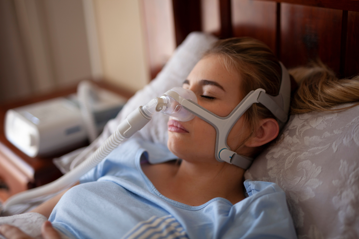 Woman sleep apnea machine