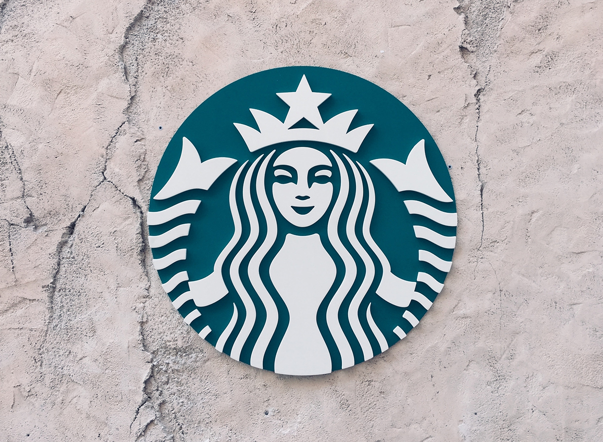 Large Starbucks logo on a wall