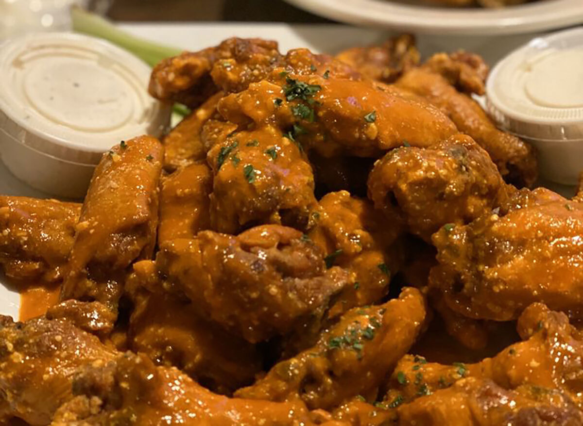 chicken wings topped with scallions