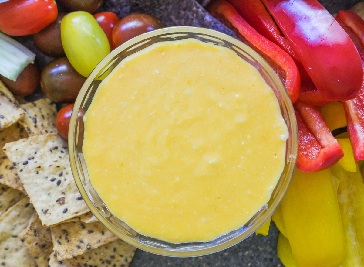 healthy queso dip with veggies and chips