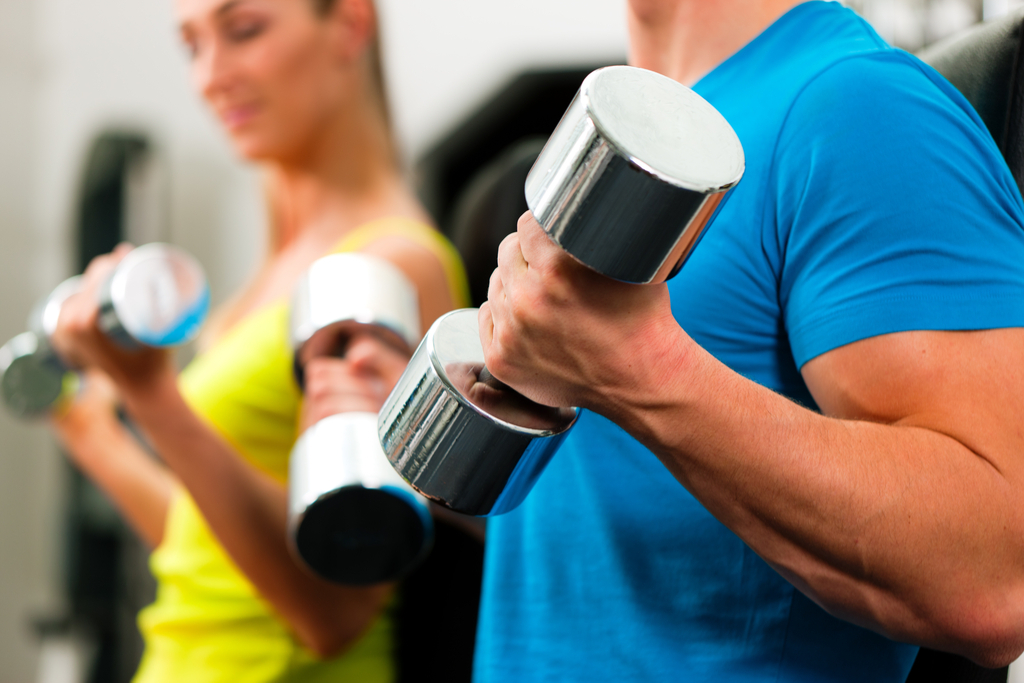 Couple Lifting Weights