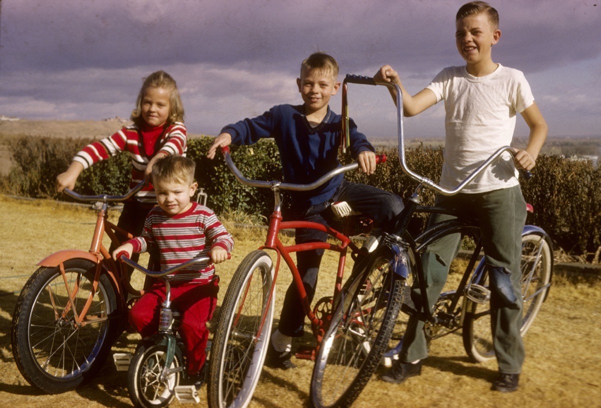 1960s kids on bikes BH3751 Four children on bicycles in 1964.. Image shot 1964. Exact date unknown.