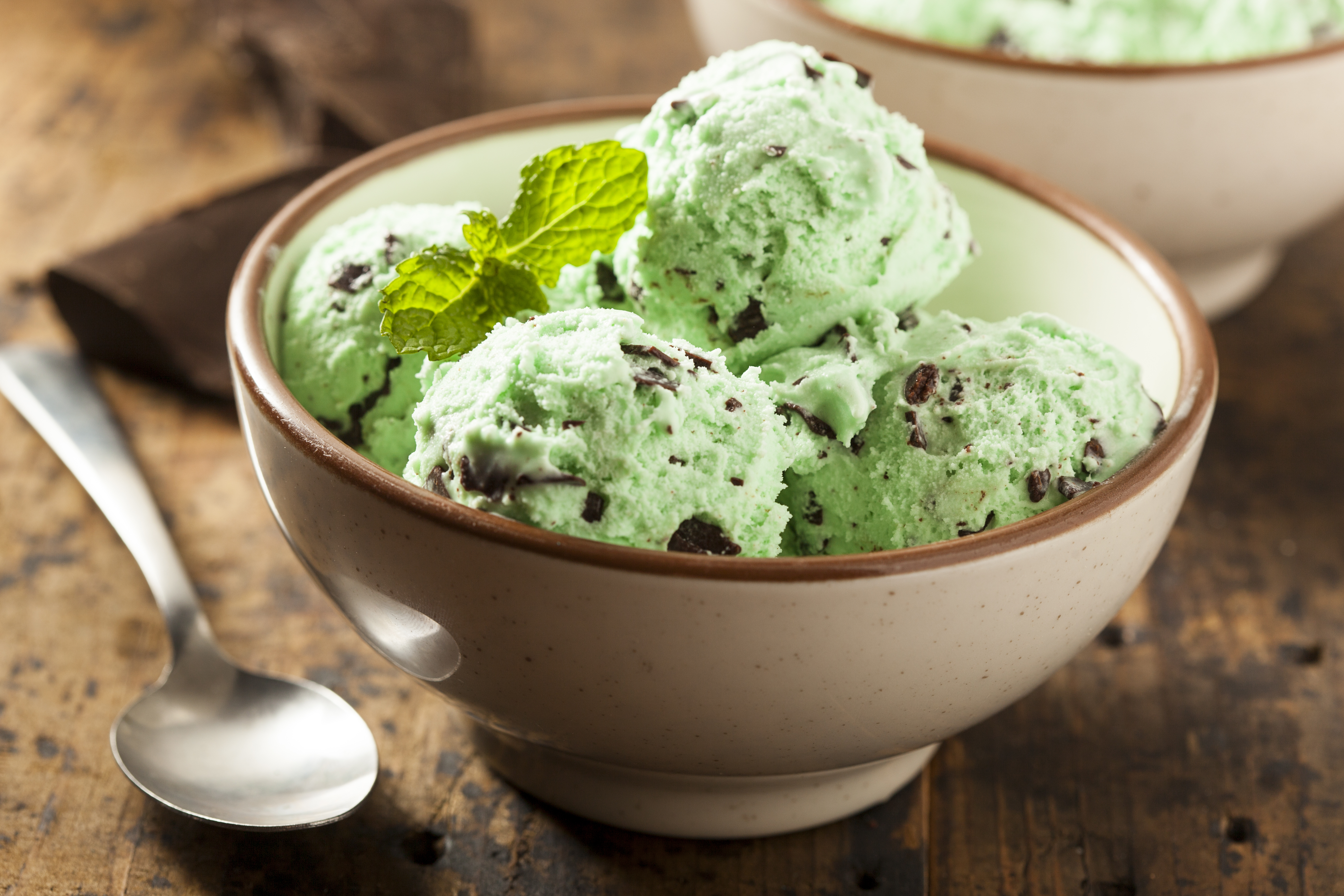 Organic Green Mint Chocolate Chip Ice Cream with a Spoon