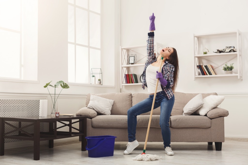 mom dancing with mop