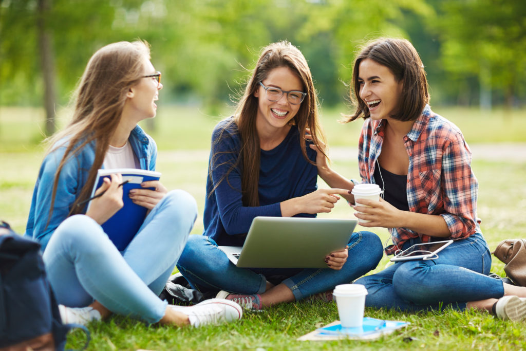 Girls Laughing and Studying crazy health benefits of laughter