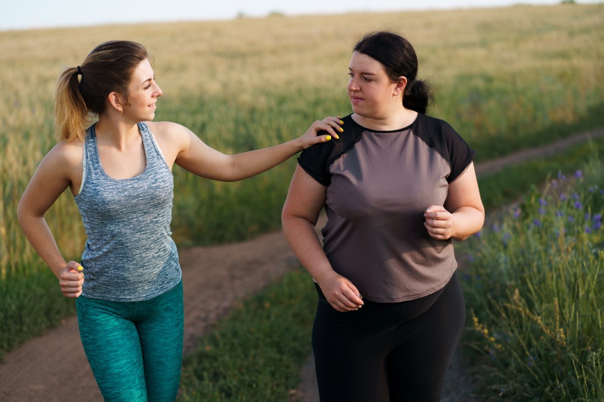 two women in a couple walking outdoors