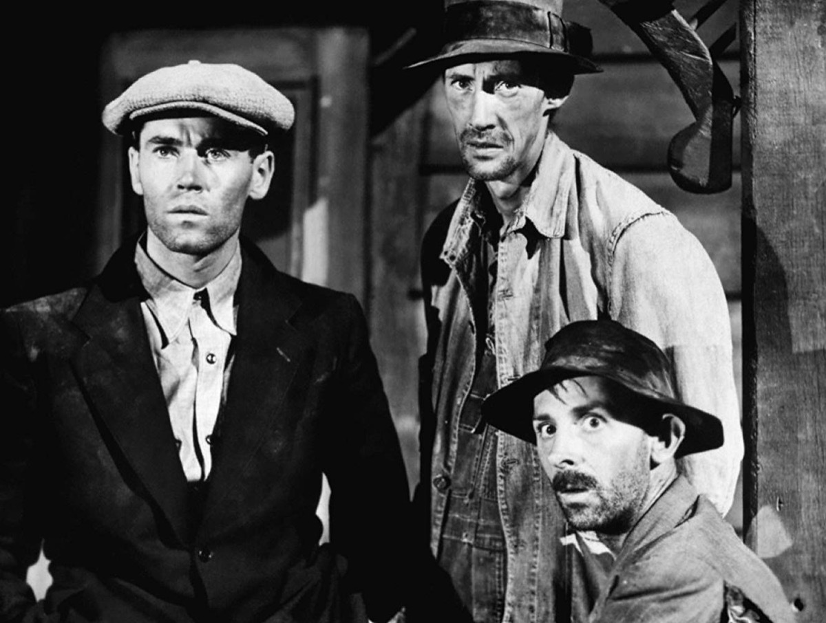 Henry Fonda, John Carradine, and John Qualen in The Grapes of Wrath (1940)