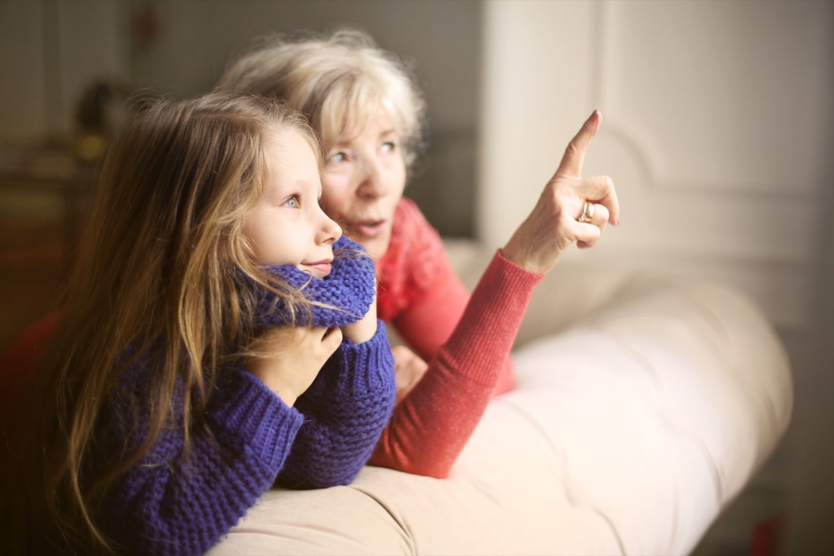 Grandmother talking with granddaughter