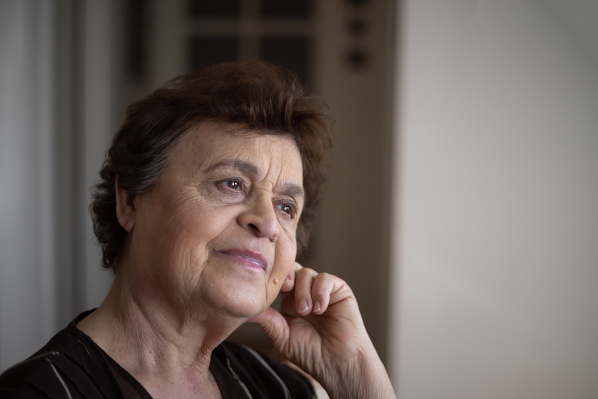 Portrait of an senior woman, Very old grandmother looking in the direction of the window