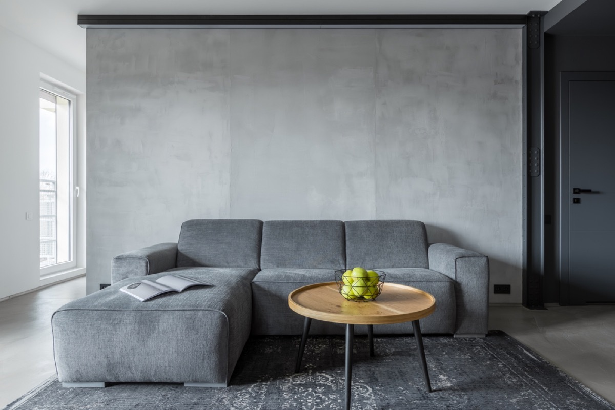 gray living room couch, interior design mistakes