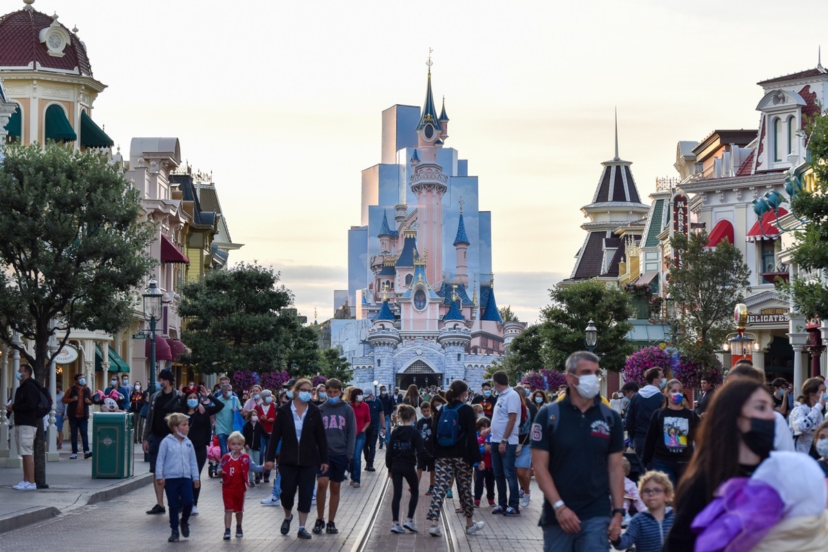 A large number of masked tourists managing to enjoy Disneyland Paris despite Covid-19 restrictions