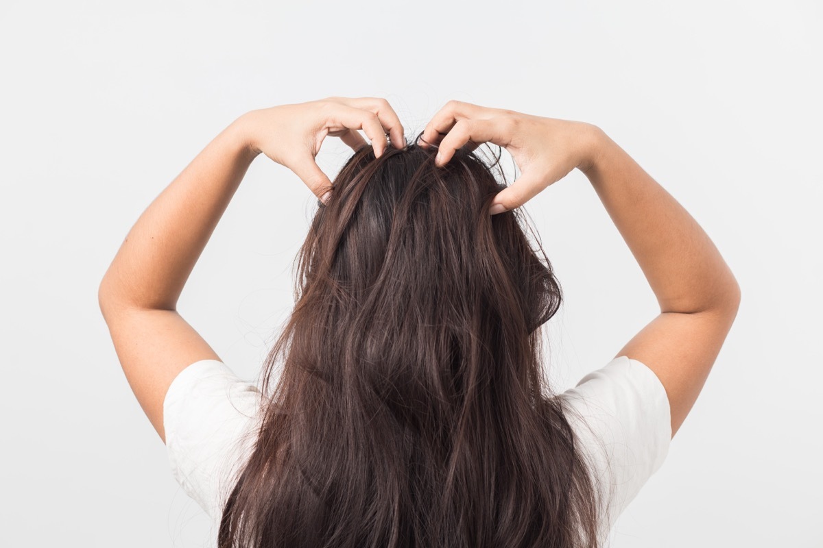 Woman Giving Herself a Scalp Massage {Pressure Points}