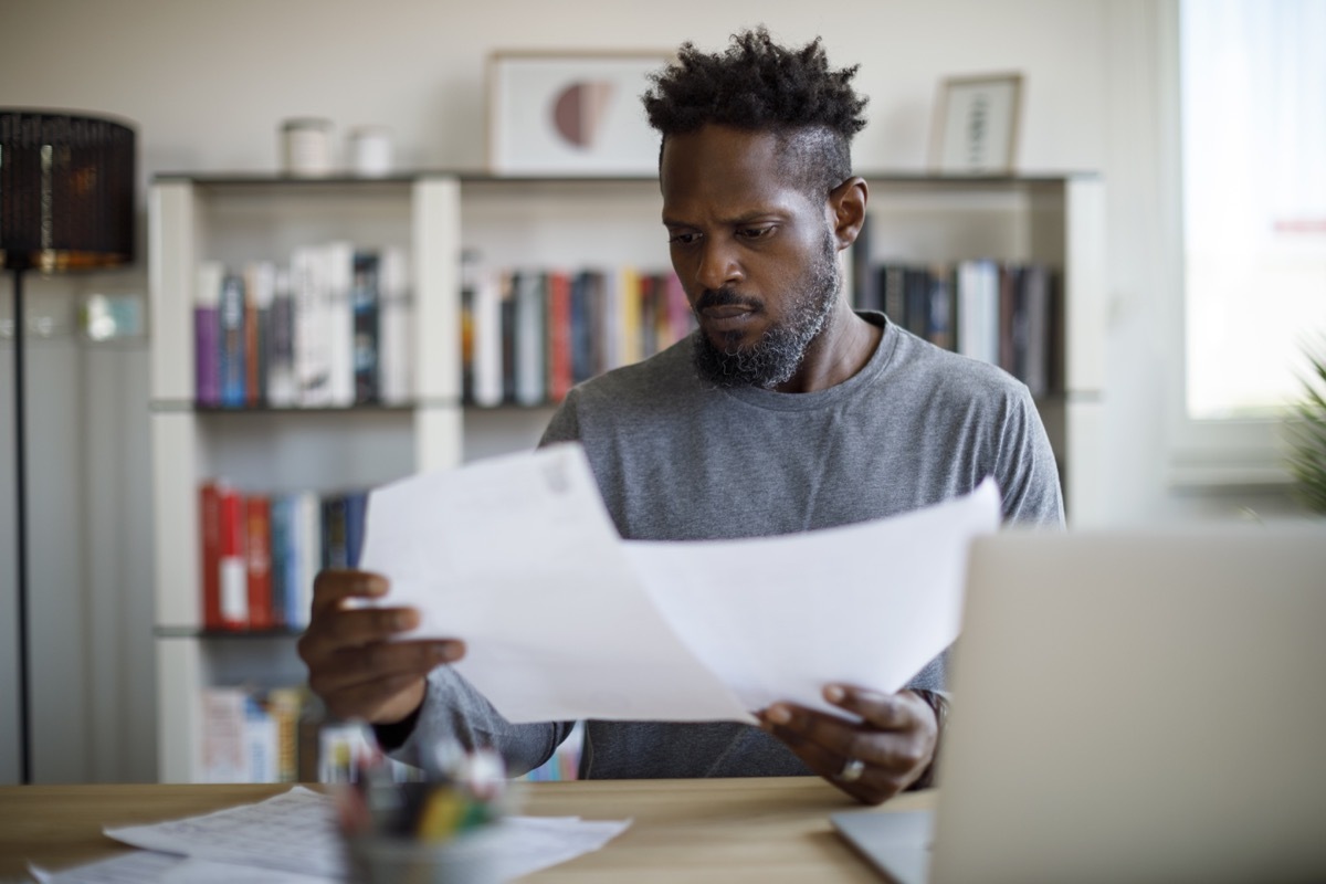 Mid adult man working at home