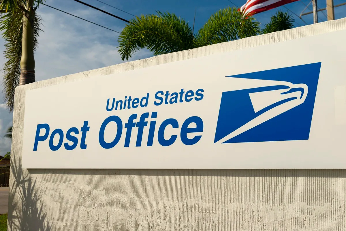 Layton, Florida, United States - August 14, 2018: View of the United States Post Office sign by the Overseas Highway in Layton, Florida Keys - United States