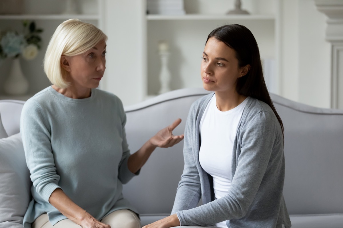 angry white grandma scolding young teen