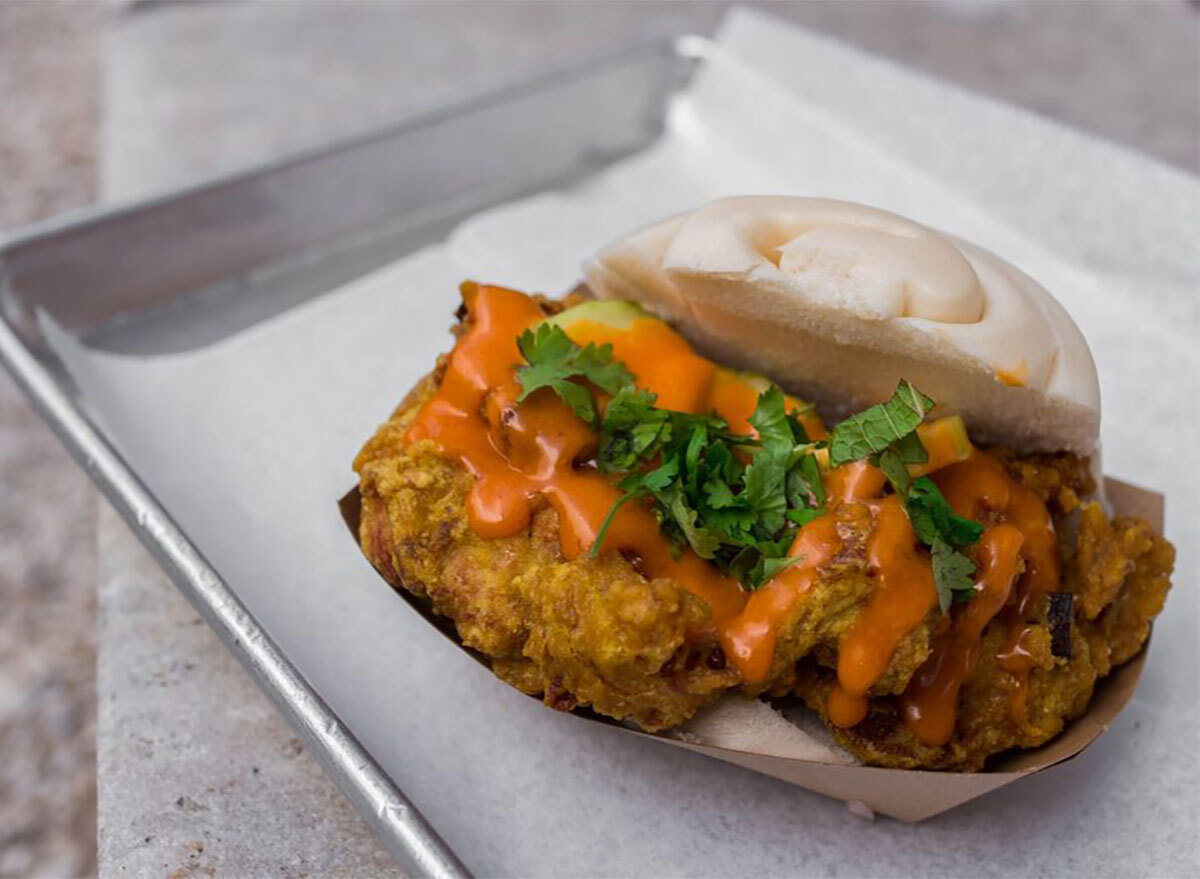 fried chicken steamed bun sandwich on tray