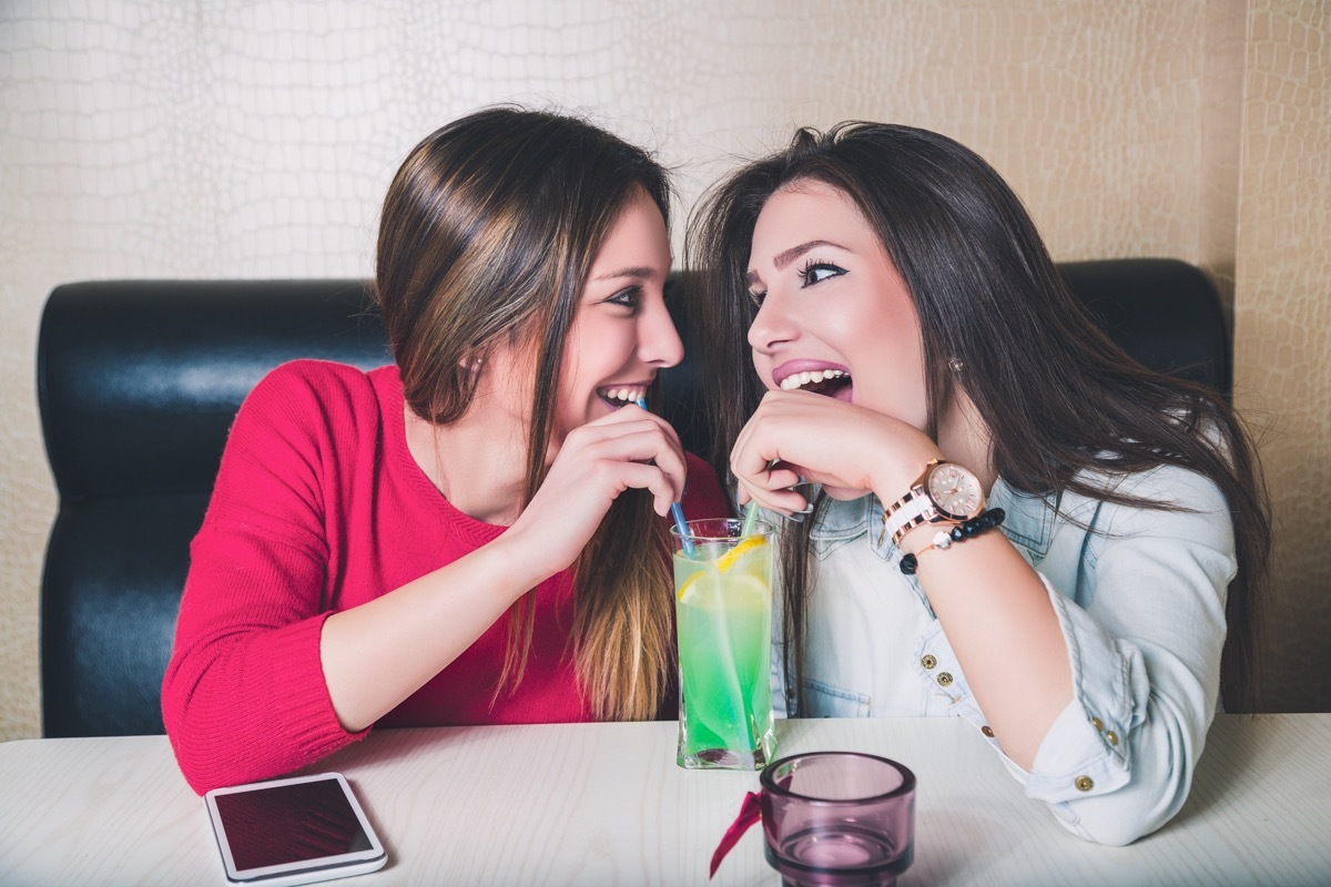 Women share fruit cocktail