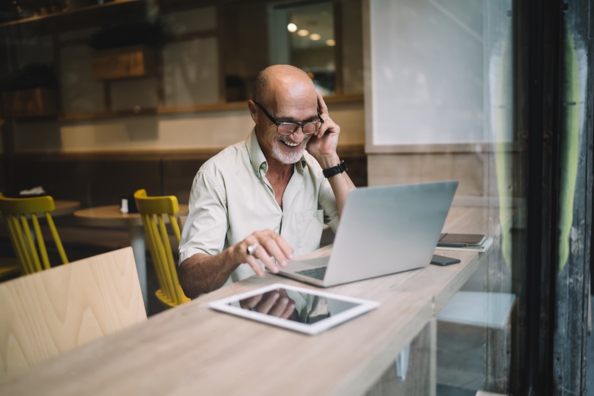 confident man working on laptop