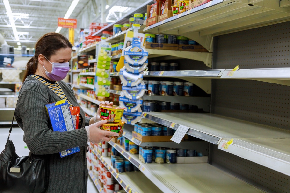 woman shopping at walmart amid covid pandemic