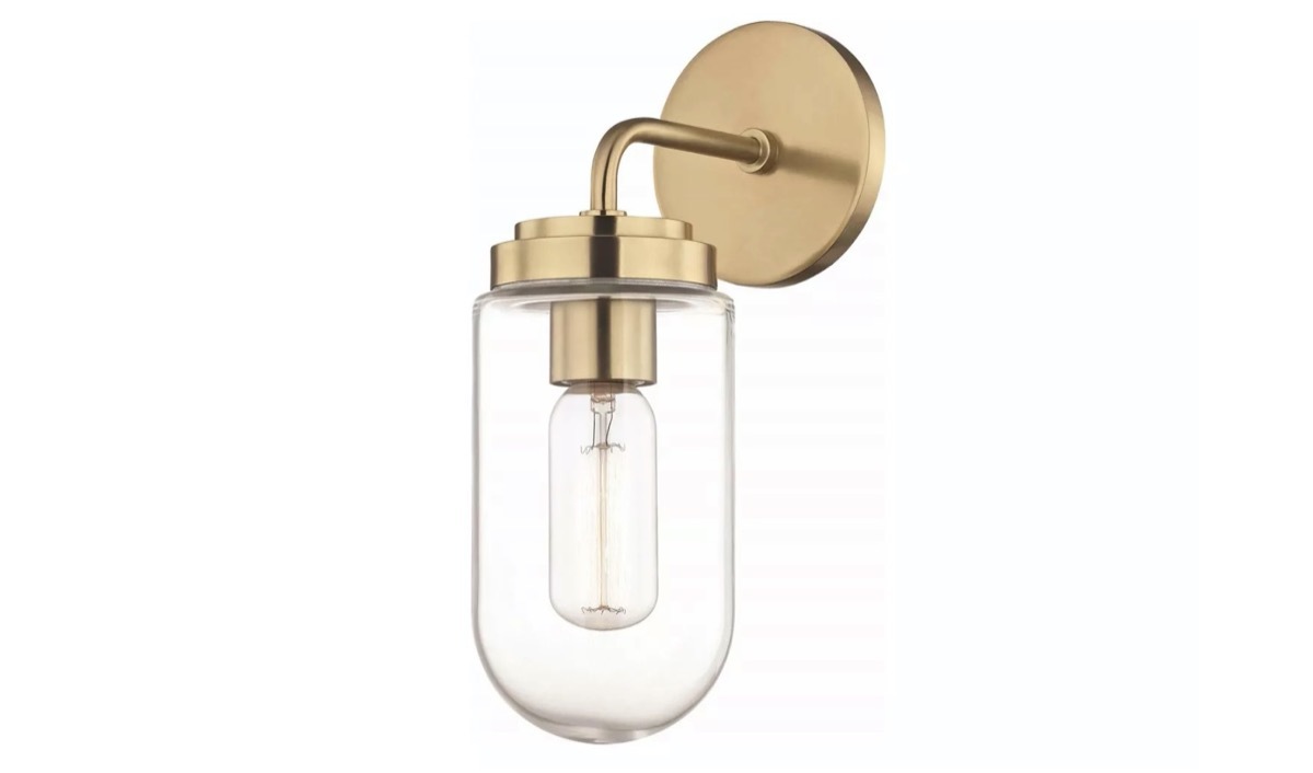 brass and clear glass sconce