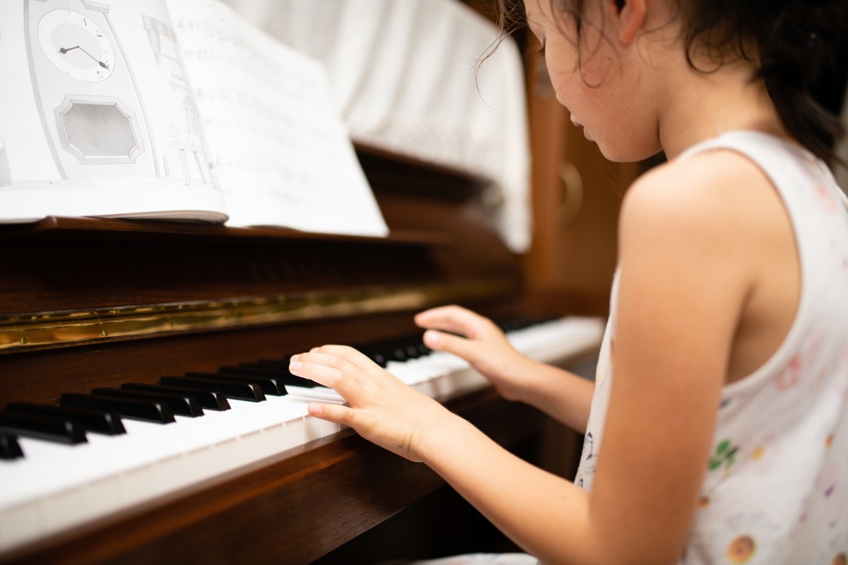 Little girl playing piano